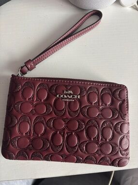 Coach Burgundy Signature Embossed Wristlet with Glitter Detail